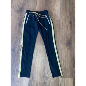 Rhude women’s black pants with gold